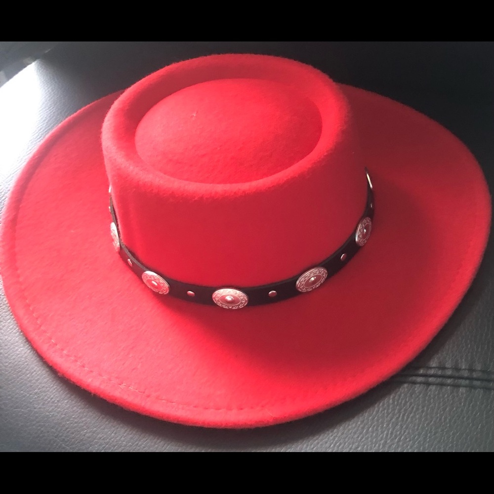 Red fedora finished with black leather trim and silver studs